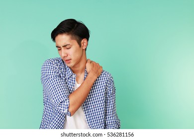 Asian Man Having A Shoulder Pain 