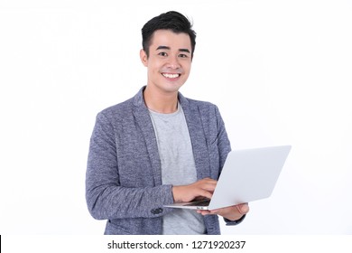 
Asian Man Holding The Computer