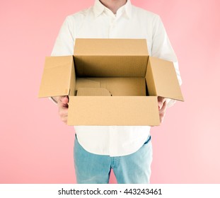 Asian Man Holding An Empty Cardboard Box