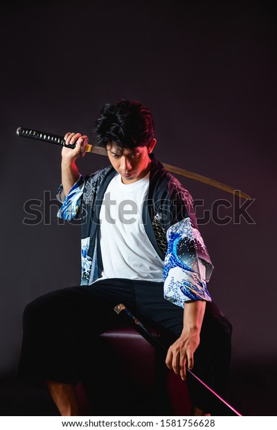 Asian Man Holding Katana Japanese Sword Stock Photo 1581756628 ...