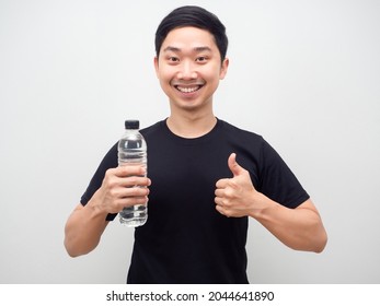 Asian Man Holding Water Bottle And Thumb Up Happy Smile,Cheerful Man With Water Bottle