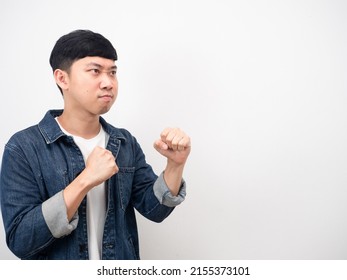 Asian Man Jean Shirt Angry Face Gesture Boxing Guard Side View Copy Space