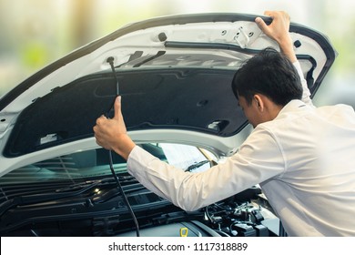 Asian Man Open Door Car With Technology Engine On Blurry Background.For Automotive Or 
Maintenance, Service Or Transport Automotive Automobile Image.