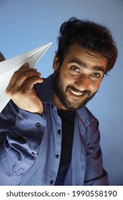 Asian Man With Paper Aeroplane - Study Abroad, Startup, Travel Concept