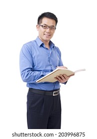 asian man with pen and notebook, isolated on white.