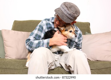 Asian Man With Pet Dog.