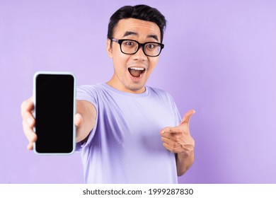 Asian Man Portrait, Posing On Purple Background