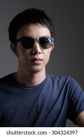 Asian Man Portrait With Retro Sunglasses