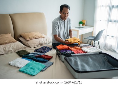 73 Asian man bring suitcase Images, Stock Photos & Vectors | Shutterstock