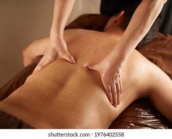 Asian Man Receiving Back Massage