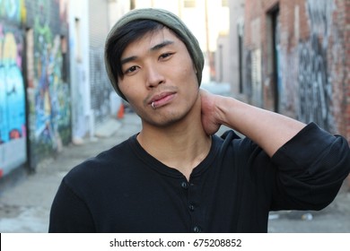 Asian Man Rocking A Beanie Outdoors