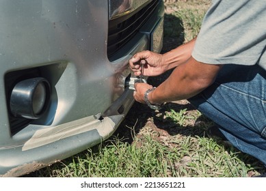 Asian Man Screws Up Connection For Hauling Van. Van Crash And Park For Service.