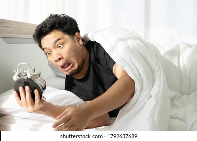Asian Man with Shocked Face after Wake Up Late and Missed the Appointment