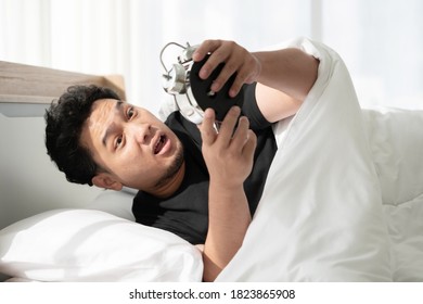 Asian Man With Shocked Face After Wake Up Late And Missed The Appointment