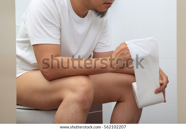 Asian Man Sitting Water Closet Stock Photo Edit Now 562102207