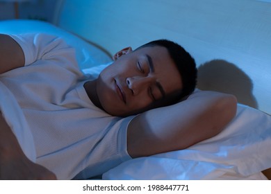 Asian Man Sleep Well With Smile At Night 