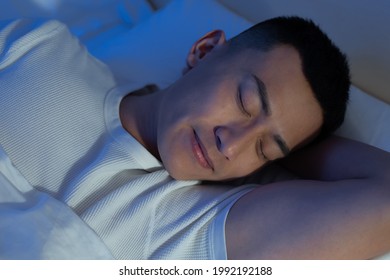 Asian Man Sleep Well With Smile At Night 