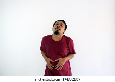 Asian Man Starving Touching Stomach