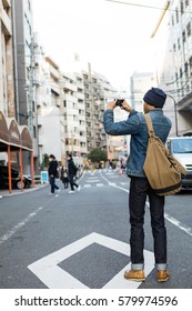 Asian Man Take Photo With Smartphone, Tokyo, Japan. 