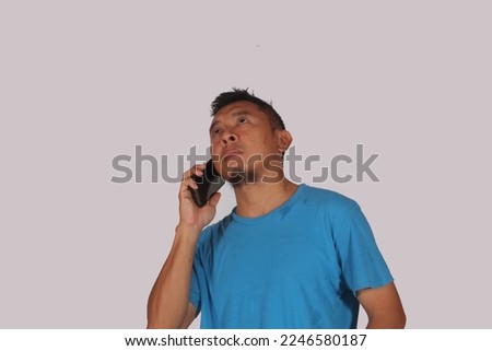 asian man thinking and calling on white background