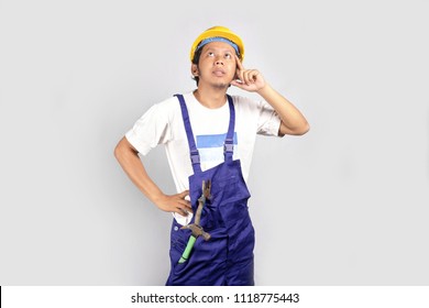 Asian Man Thinking Construction Workers. Construction Worker Thinking Isolated.