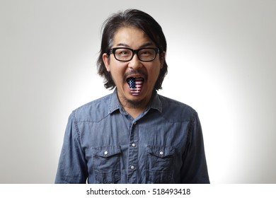 The Asian Man With Tongue Out.