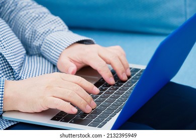 Asian Man Using The Laptop, No Face