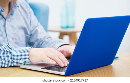 Asian Man Using The Laptop, No Face