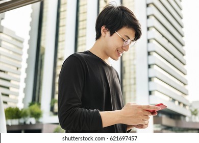 Asian Man Using Mobile Phone Connection Technology