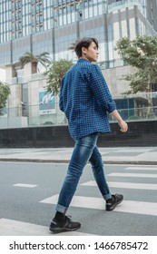 Asian Man Walking On The Street , Fashion .