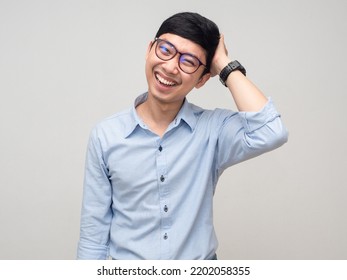 Asian Man Wear Glasses Feels Shy Hold His Head With Smile Isolated