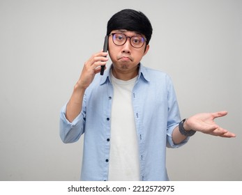 Asian Man Wear Glasses Using Mobile Phone Feels Confused Isolated