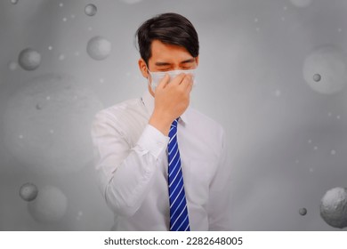 Asian man wear masks to protect PM 2.5 dust and air pollution, air pollution concept, healthcare concept.
 - Shutterstock ID 2282648005