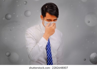 Asian man wear masks to protect PM 2.5 dust and air pollution, air pollution concept, healthcare concept.
 - Shutterstock ID 2282648007