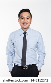 Asian man wearing business attire smiling 