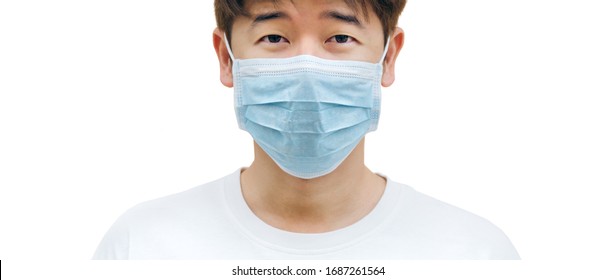 Asian Man Wearing Face Mask Against The Corona Virus, Covid-19. Close Up Of  Asian Man Wearing Face Mask With White Background. Banner Of Asian Man Wearing Mask With Isolated Background.