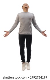 Asian man wearing grey shirt black denim and white shoes, jump flying levitation, happy expression. Full body portrait isolated cut out