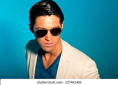 Asian Man Wearing Suit And Sunglasses. Summer Fashion. Studio.