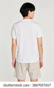 Asian Man In A White Tee Mockup Rear View