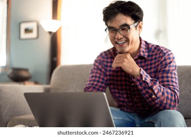 asian man work using computer hand typing laptop keyboard contact us.student study learning education online.adult professional people chatting search at office.concept for technology device business