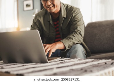 asian man work using computer hand typing laptop keyboard contact us.student study learning education online.adult professional people chatting search at office.concept for technology device business