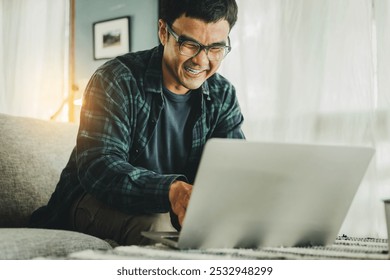 asian man work using computer hand typing laptop keyboard contact us.student study learning education online.adult professional people chatting search at office.concept for technology device business
