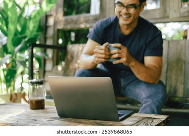 asian man work using computer hand typing laptop keyboard contact us.student study learning education online.adult professional people chatting search at office.concept for technology device business