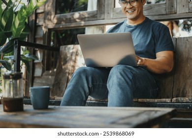 asian man work using computer hand typing laptop keyboard contact us.student study learning education online.adult professional people chatting search at office.concept for technology device business