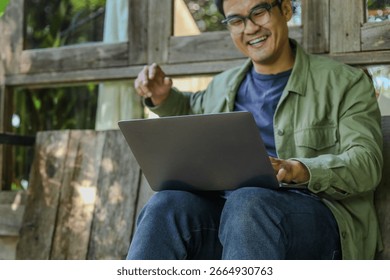 asian man work using computer hand typing laptop keyboard contact us.student study learning education online.adult professional people chatting search at office.concept for technology device business - Powered by Shutterstock - Get 15% off with code: PIKWIZARD15