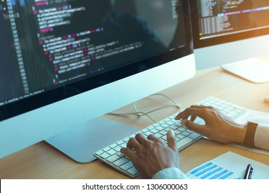 Asian man working code program developer computer web development working design software on desk in office.