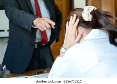 asian manager boss angry to employees  who are not working according to orders or are late in the office - Shutterstock ID 2256783511