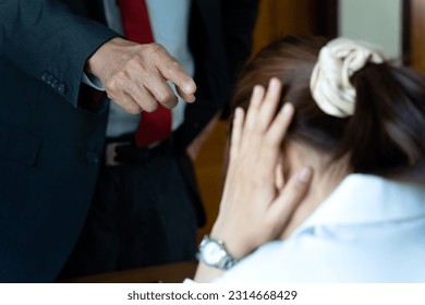 asian manager boss angry to employees  who are not working according to orders or are late in the office - Shutterstock ID 2314668429