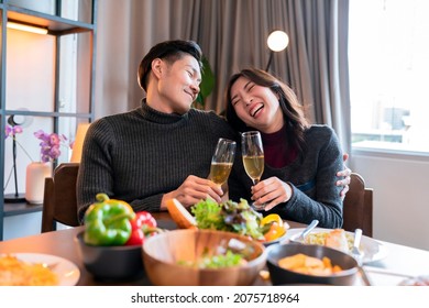 asian marry couple happiness cheerful dinner ,Beautiful adult couple toasting with glasses of wine sitting at wooden table.thanksgiving dinner christmas festive holiday,family celebrate concept - Powered by Shutterstock