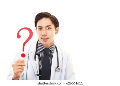 Asian Medical Doctor With A Question Mark